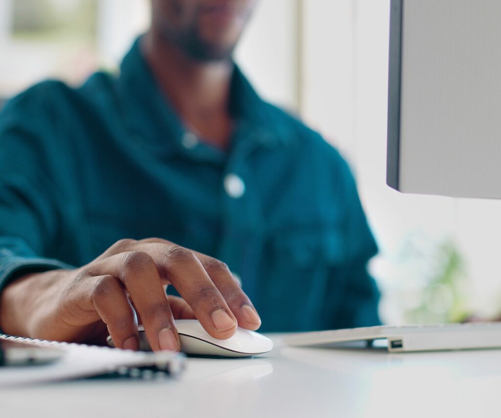 Office computer mouse, hands and black man working feedback review of social media, customer experience or ecommerce. Website analytics, research report and media analyst doing online survey analysis