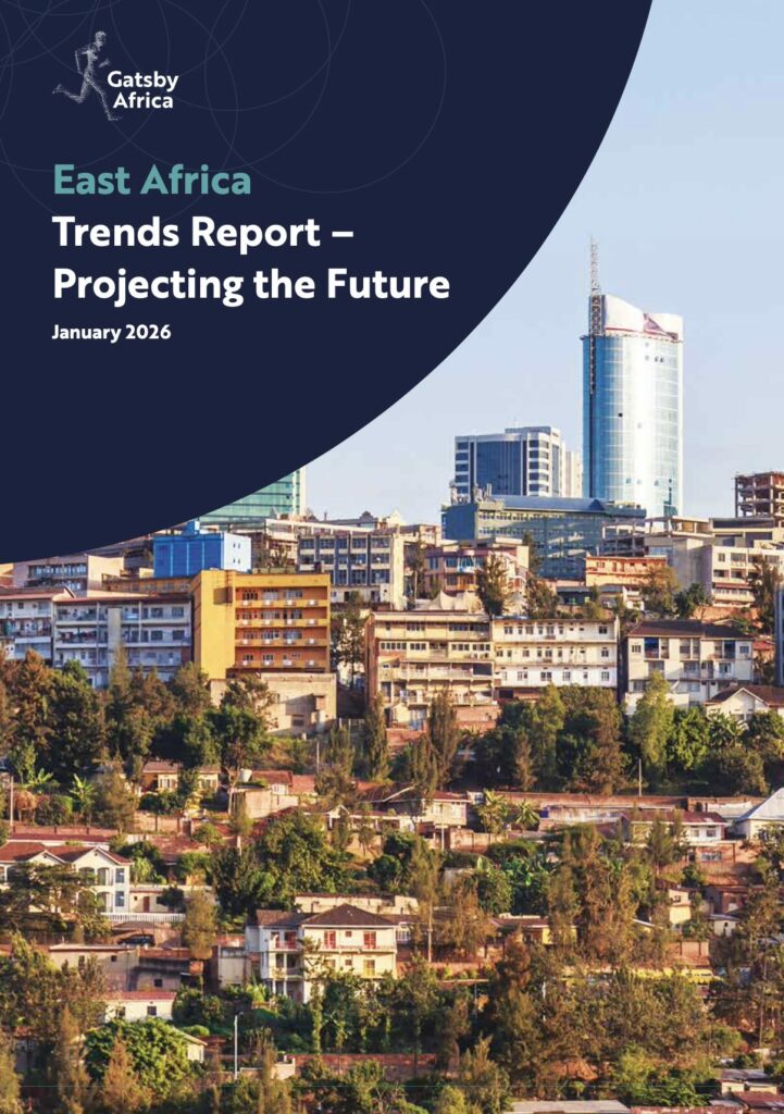 Cover image for the “Gatsby Africa East Africa Trends Report – Projecting the Future,” dated January 2026, featuring a modern East African city skyline with high-rise glass office towers and mid-rise buildings rising above green, tree-filled residential hillsides; bold navy and blue graphic overlay with circular design elements and the Gatsby Africa logo in the top left, conveying urban growth, economic development, and future trends in East Africa.